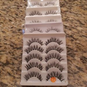 6packs of false eyelashes.Clear flexible band